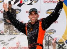Aric Almirola celebrates his first NASCAR Camping World Truck Series win in Victory Lane at Dover International Speedway. He called the win “a dream come true.” Credit: Geoff Burke/Getty Images for NASCAR